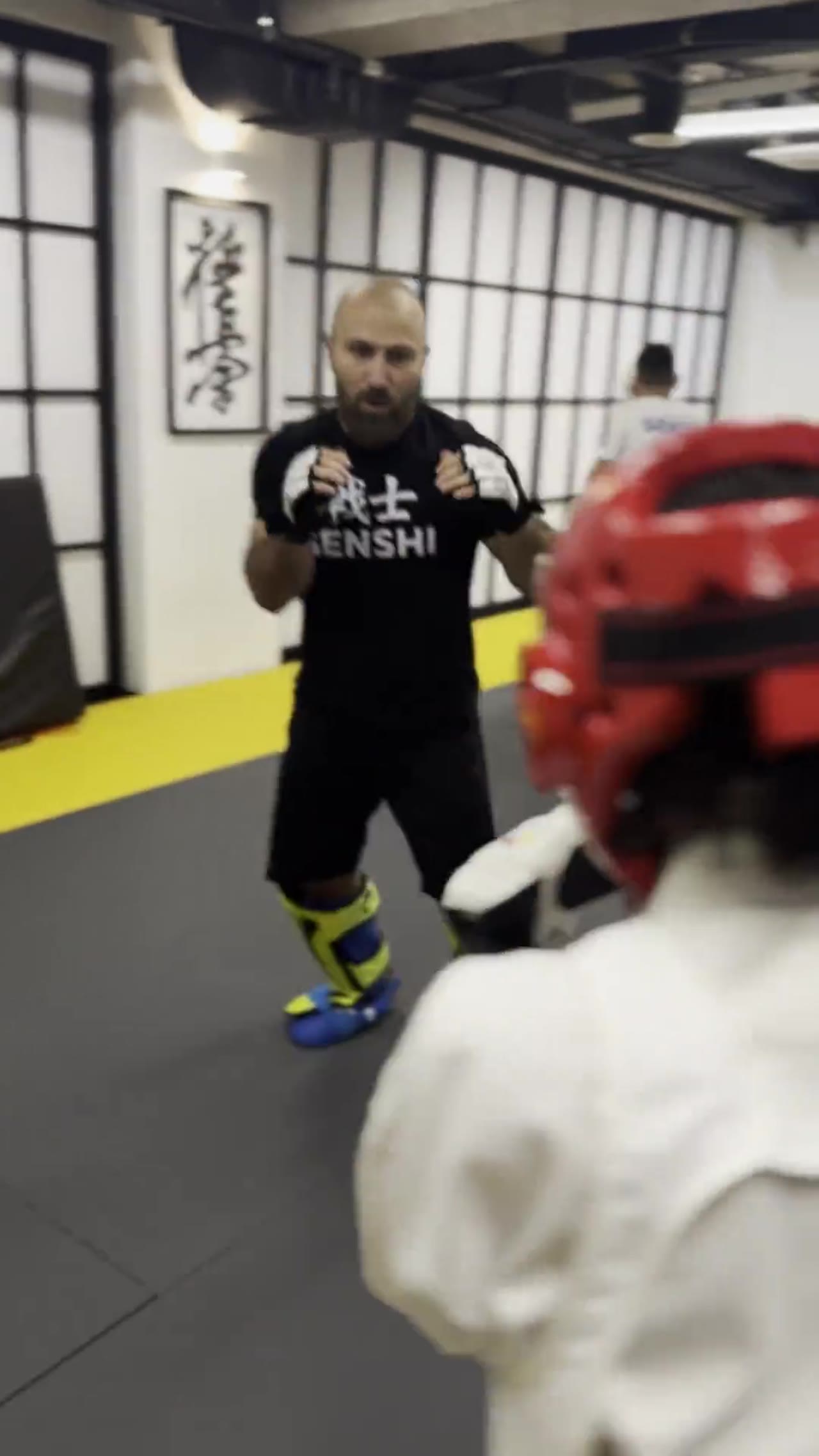 Archive video of kyokushin karate sparring with protective gear